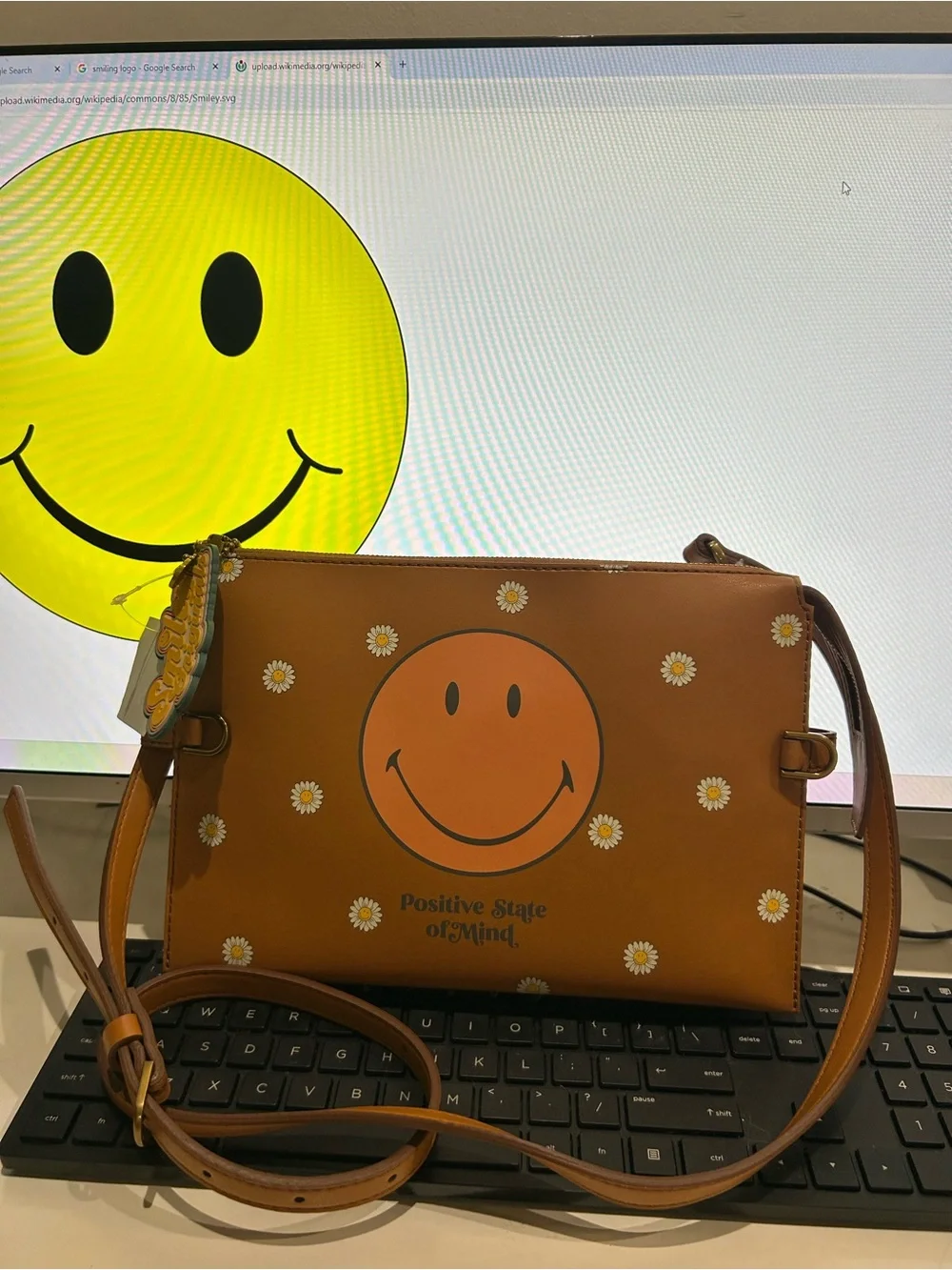 Fossil Brown & Orange Smiley Wristlet Clutch